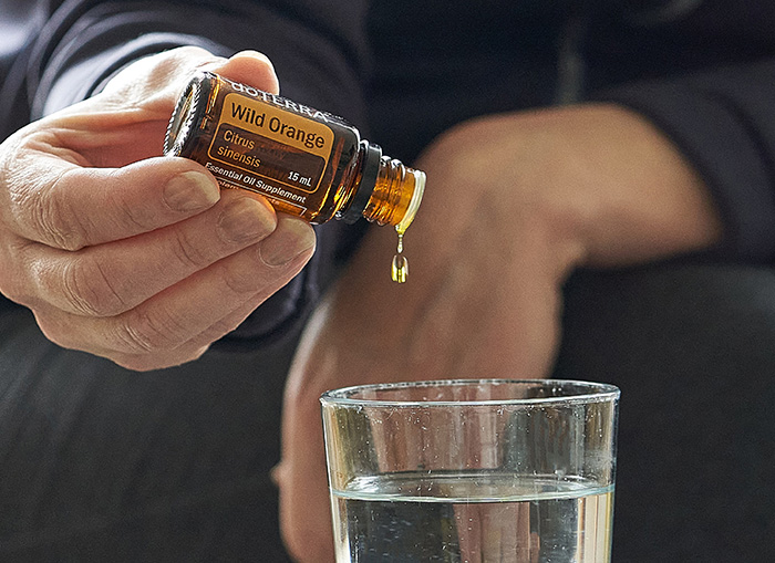 Naranja Silvestre doTERRA — usos aromáticos y tópicos en rutina diaria